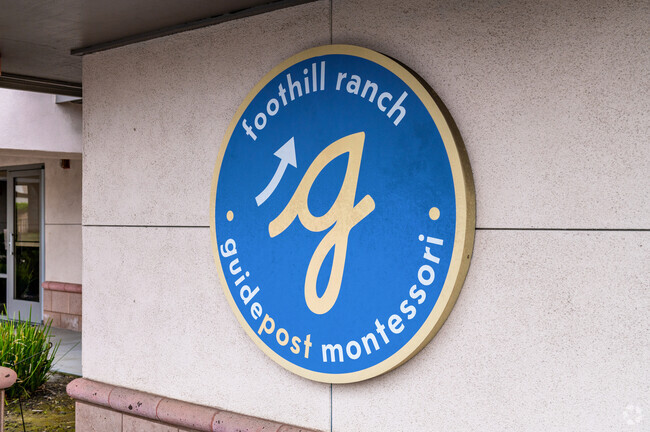 The Guidepost Montessori sign welcomes young students.