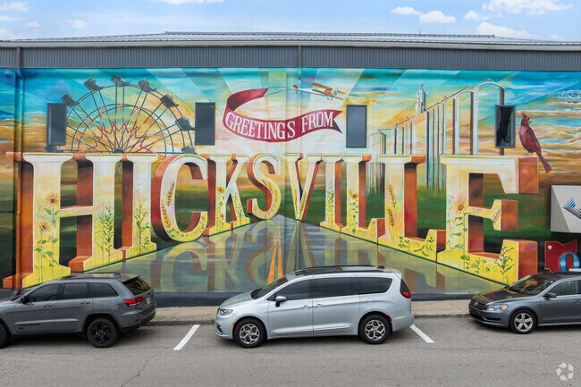 Colorful mural in downtown Hicksville adds charm and celebrates community pride.