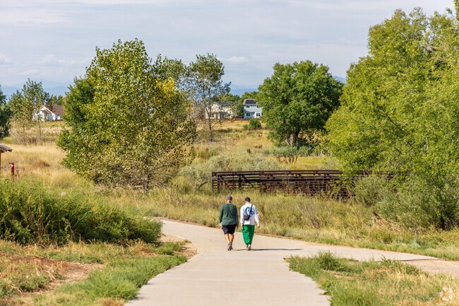 Residents enjoy walks on the Big Dry Creek Trail near Harmony Park.
