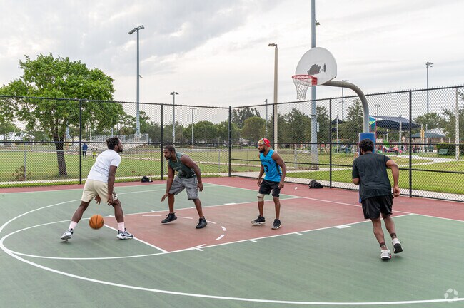 Neighborhood friends enjoying a basketball game in Southbend Lakes.