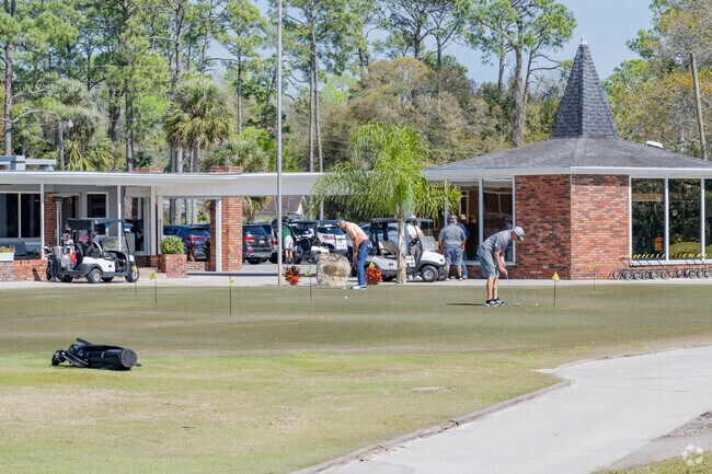 Grab a bucket of balls or just putt around at Riviera Country Club near Tuscany Woods.