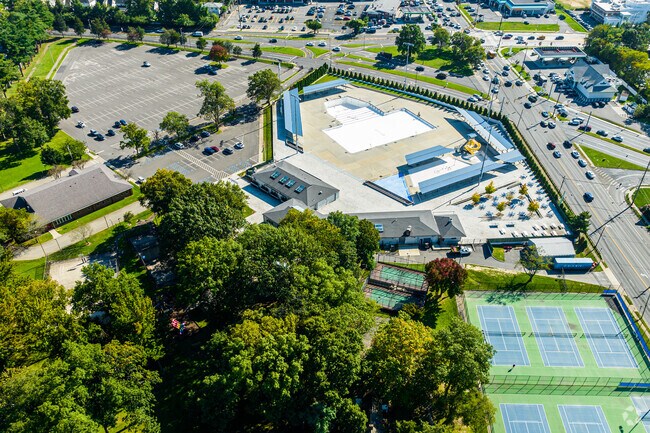 Clinton G Martin Park encompasses a big area and parking lot.