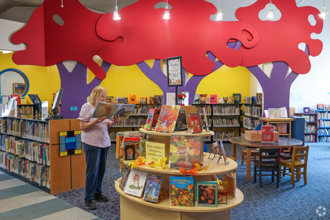 Pay a visit to the Lewiston Library near Pond Road and discover a new book.