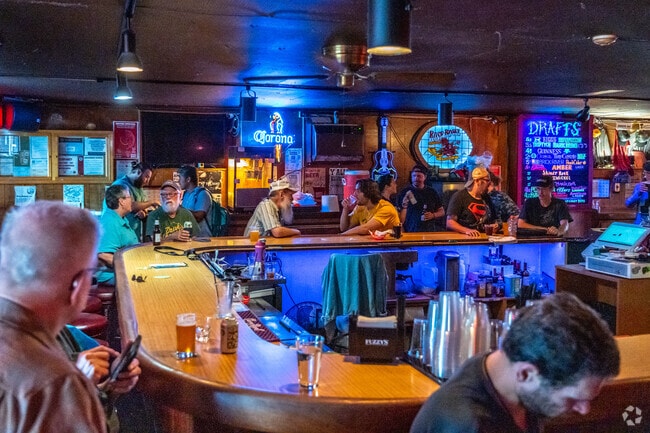 Patrons enjoy drinks and music at the Rose Bowl Tavern near Historic East Urbana.
