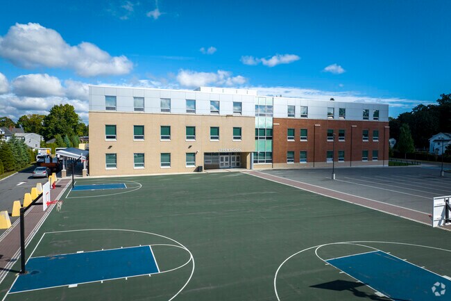 Young students can learn to play basketball at the Caleb Dustin Hunking School.