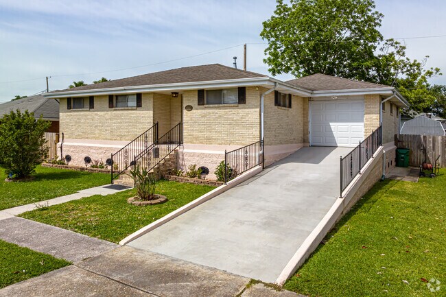 Many homes have been raised in New Metairie North due to the rise in sea level.