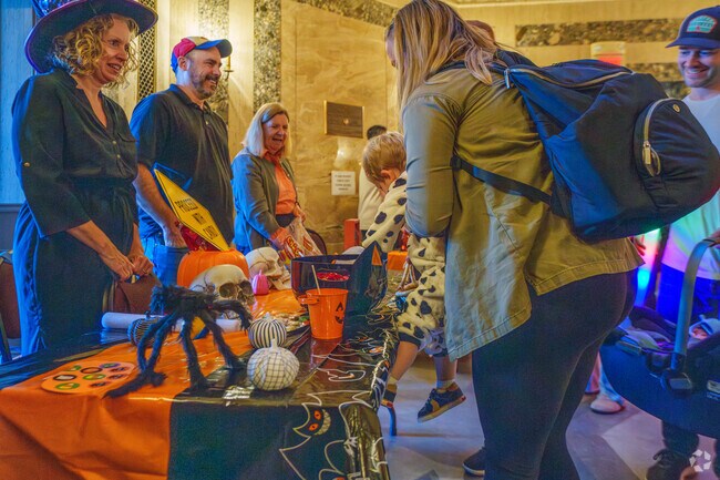 Young ones grab the best of candies during the Trick or Treat at the Woburn City Hall