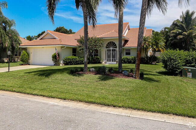 Many single-family homes in Palm City feature mediterranean inspired architectural features.