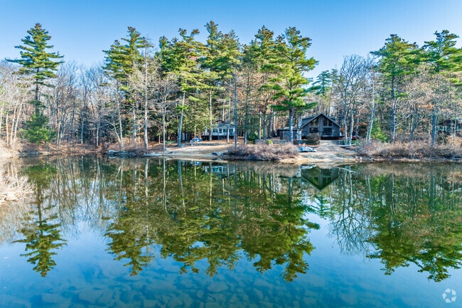 The shores of Mt. William Pond in Weare are lined with many rustic homes and log cabins.