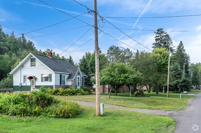 Homes in the Fond Du Lac neighborhood are wood framed typically with painted wood siding.