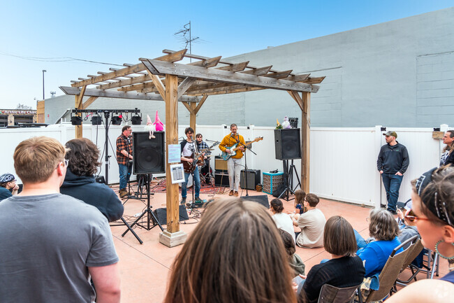 A band performs outside during the You Name It Fest in Downtown Bismarck near Highland Acres.