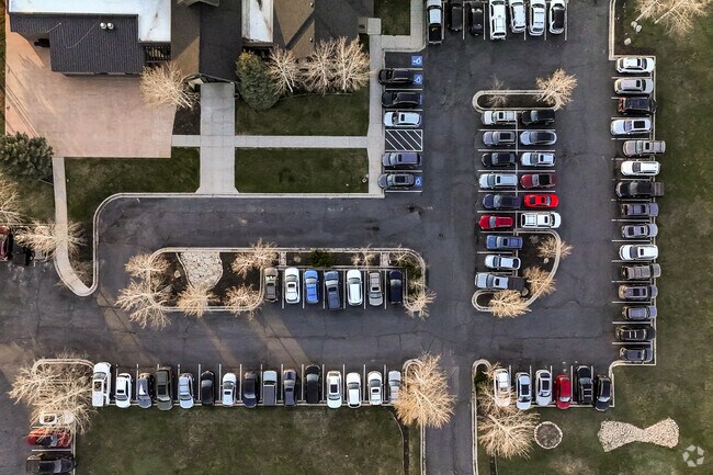 There is a small parking lot in front of Telos Classical Academy.