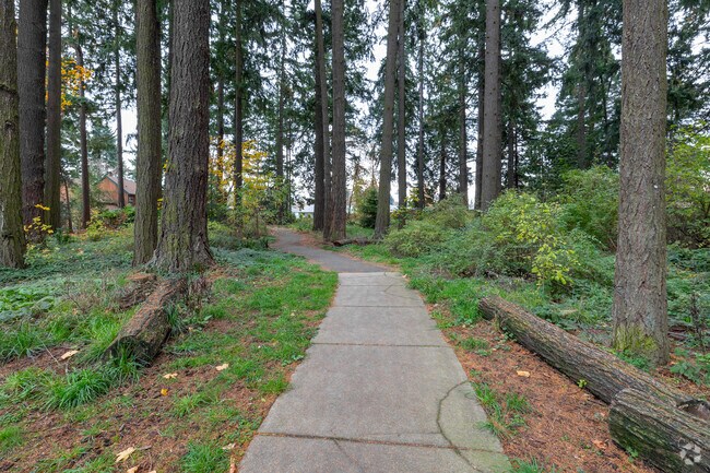 Walk the path at Alma Myra Park on SE Thiessen Rd in Portland.