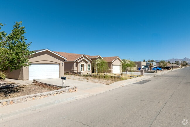 The quiet streets of Hacienda Acres offer space, privacy, and mountain views.