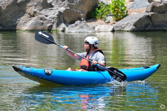 A kayaker prepares to paddle out into the Potomac River at Great Falls near Garrett Park.