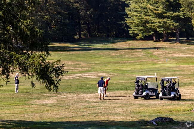 Golf enthusiasts play at North Fork Country Club near Upper Yoder.