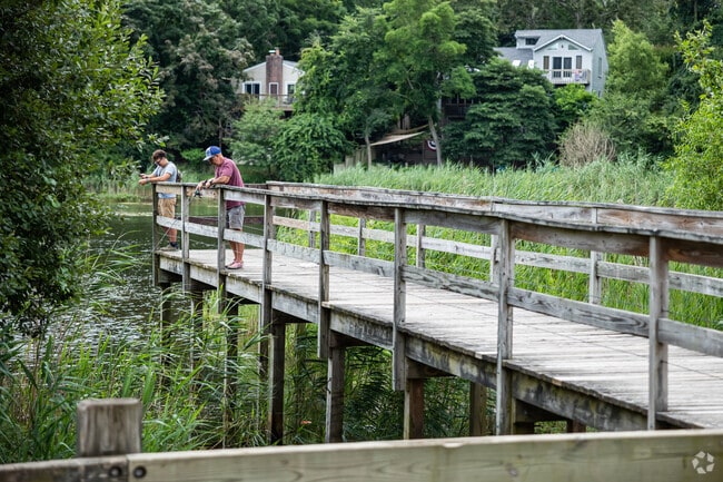 This father and son love spending time together at Pine Lake in Middle Island.