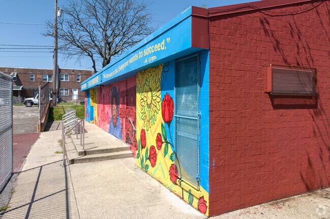 Displayed on a Yorktown recreation center, the mural of Marie Dendy captures attention.