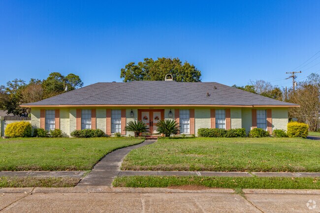 Wilshire Park has homes with well manicured lawns and lush gardens.