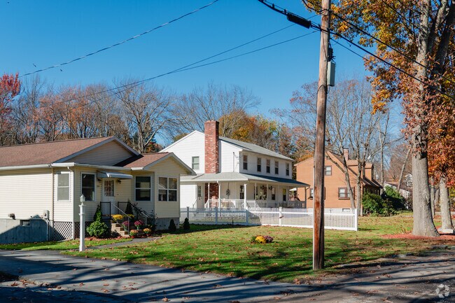 Many homes in Webster Square have large front yards and porches.