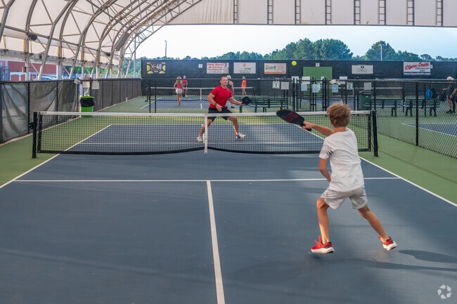 Enjoy a friendly game of pickle ball at the Opelika Sportsplex near Stephen Woods.