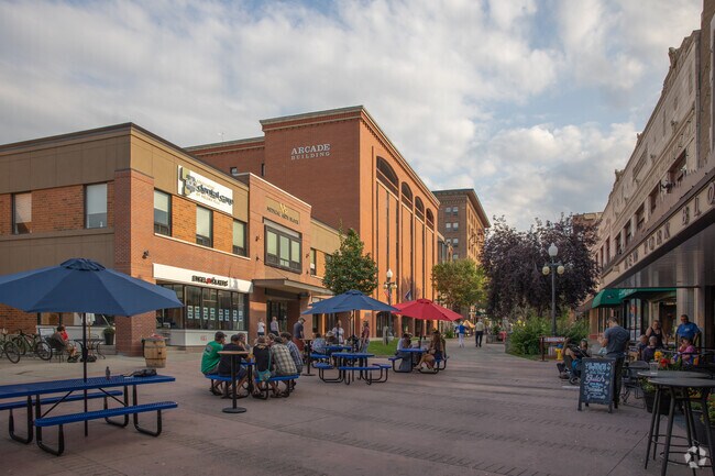 Relax at a vibrant outdoor patio in downtown Helena, perfect for casual dining.