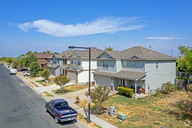 Homes within Lexington Park in Garfield tend to have both brick and wooden plank facades.