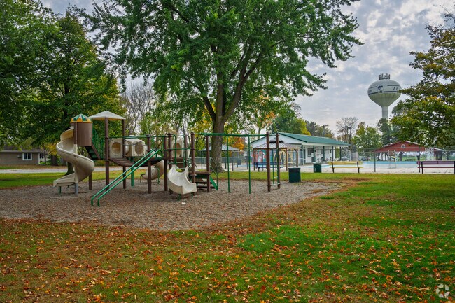 Ray Plut Park provides year-round recreation with summer pool activities, baseball games, basketball play, and playground equipment that keeps children and families active.