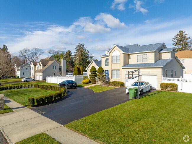 Most homes in Eatontown have driveways with garages.