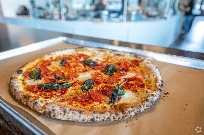 Enjoy a freshly made pizza at Antico in Smoke Rise.
