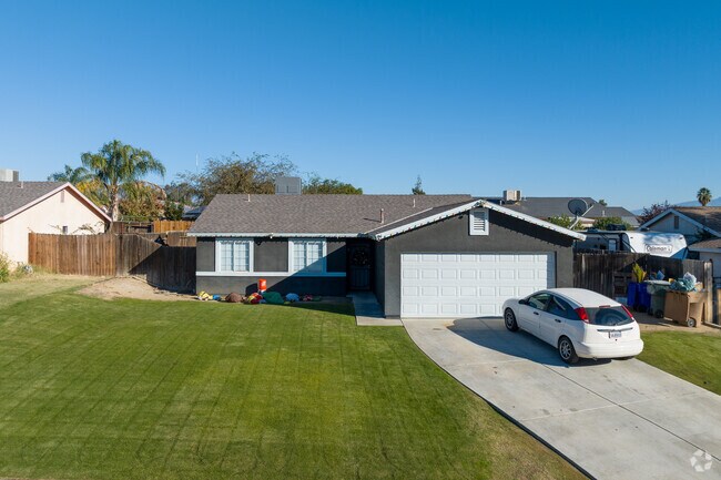 A contemporary home in Edison features a gabled front wing.