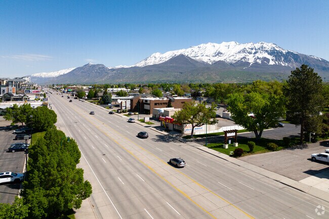 The majestic and iconic Mount Timpanogos, an awe-inspiring sight, towers over Orem South.