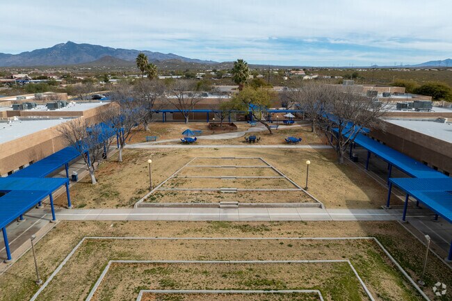 Students can enjoy an open grass plaza in the middle of campus at Acacia Elementary School
