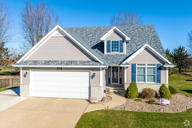 Smaller gabled homes can be found closer to the established neighborhoods of Davenport.