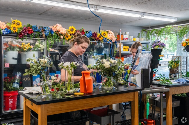 Maggie & Moe's Poplar Flowers & Decor provides floral arrangements for weddings and events.