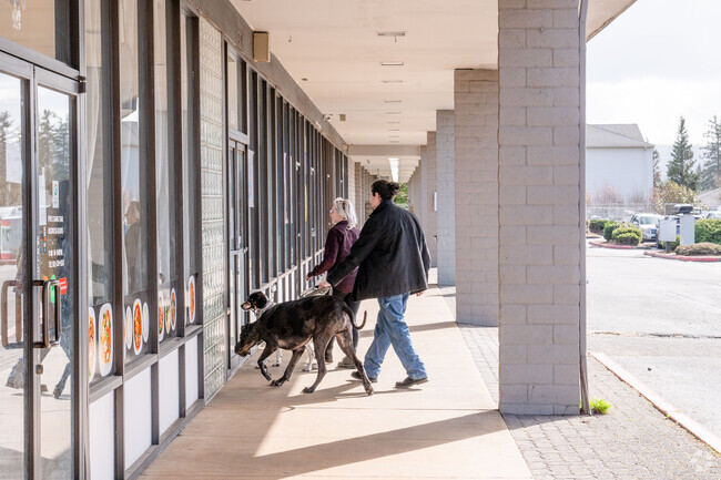 The residents of Sweetbriar neighborhood enjoy walks with their pets.
