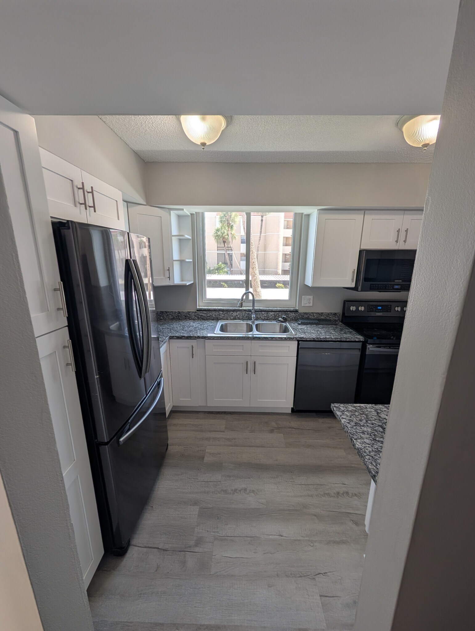 Kitchen with all new cabinets and flooring