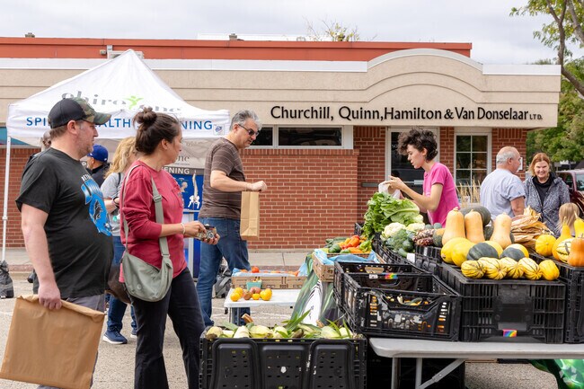 Bright and fresh produce attracts shoppers at the bustling Grayslake Farmers Market on Saturday.