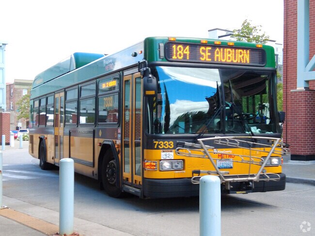 Metro buses and trains depart from Auburn station.