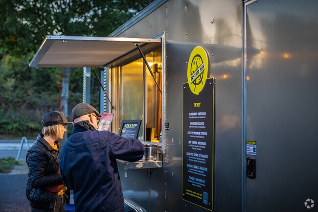 Pick up a savory pizza from Bastard Pies located in The Craft District near Trosper.