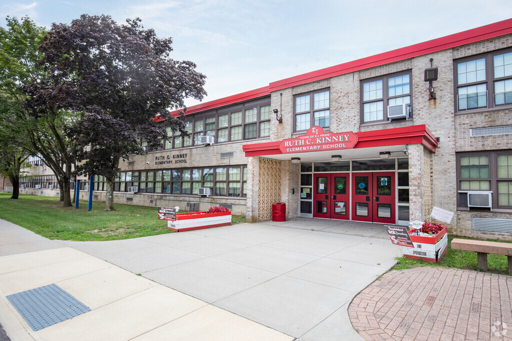 Ruth C Kinney Elementary School main entrance in Islip Terrace, NY emphasizes quality education.