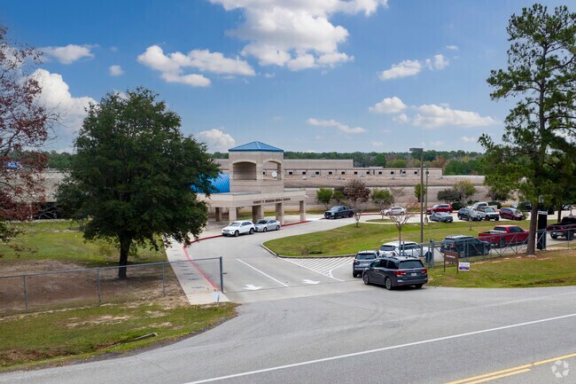 Parents begin to line up outside Brabham Middle School.