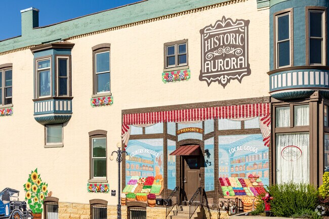 Painted mural celebrating the Historic District of Downtown Aurora.