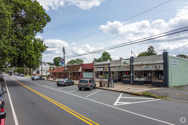 Pull into the angle parking spaces on each road in front of the local shops and restaurants.