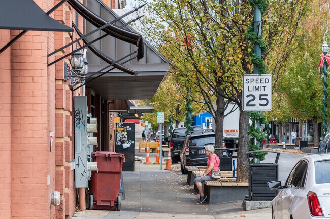 An elderly Gump Addition-Carnegie resident enjoys a break while shopping.