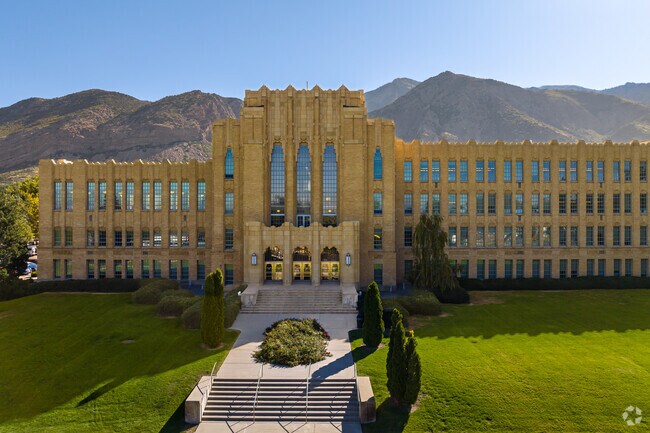 Ogden High School is a grand gothic building at the base of the mountains.