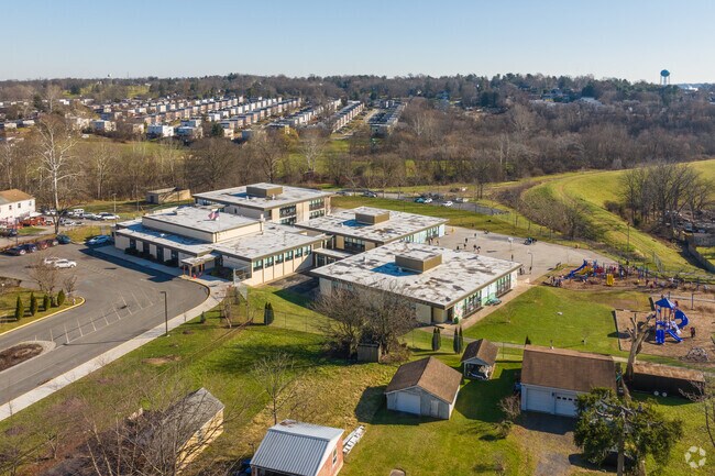 Hancock Elementary School serves grades 1-4 with a C rating on Niche.com.