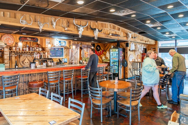 Game Restaurant serves salads, meats and specialty burgers made from exotic animals.