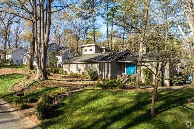 The homes of Olde Providence are surrounded by natural beauty and old growth trees.