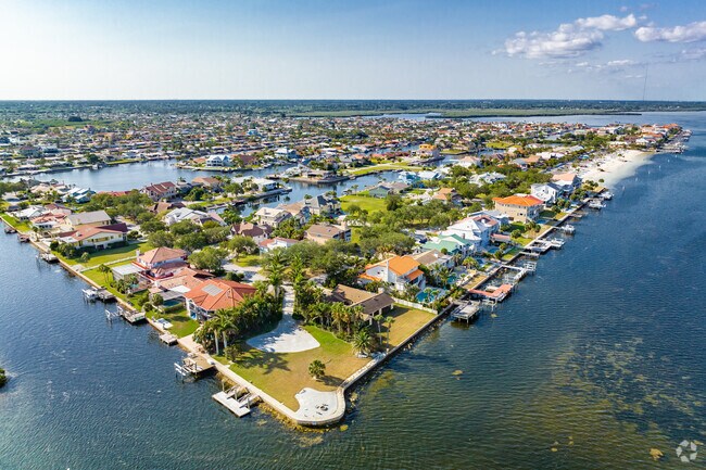 Waterfront living at it's finest can be achieved in Flor-A-Mar.